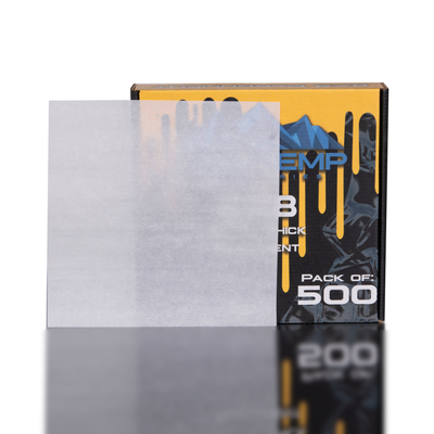 8x8 inch extra thick parchment paper for rosin pressing, shown with branded Lowtemp 500-pack box