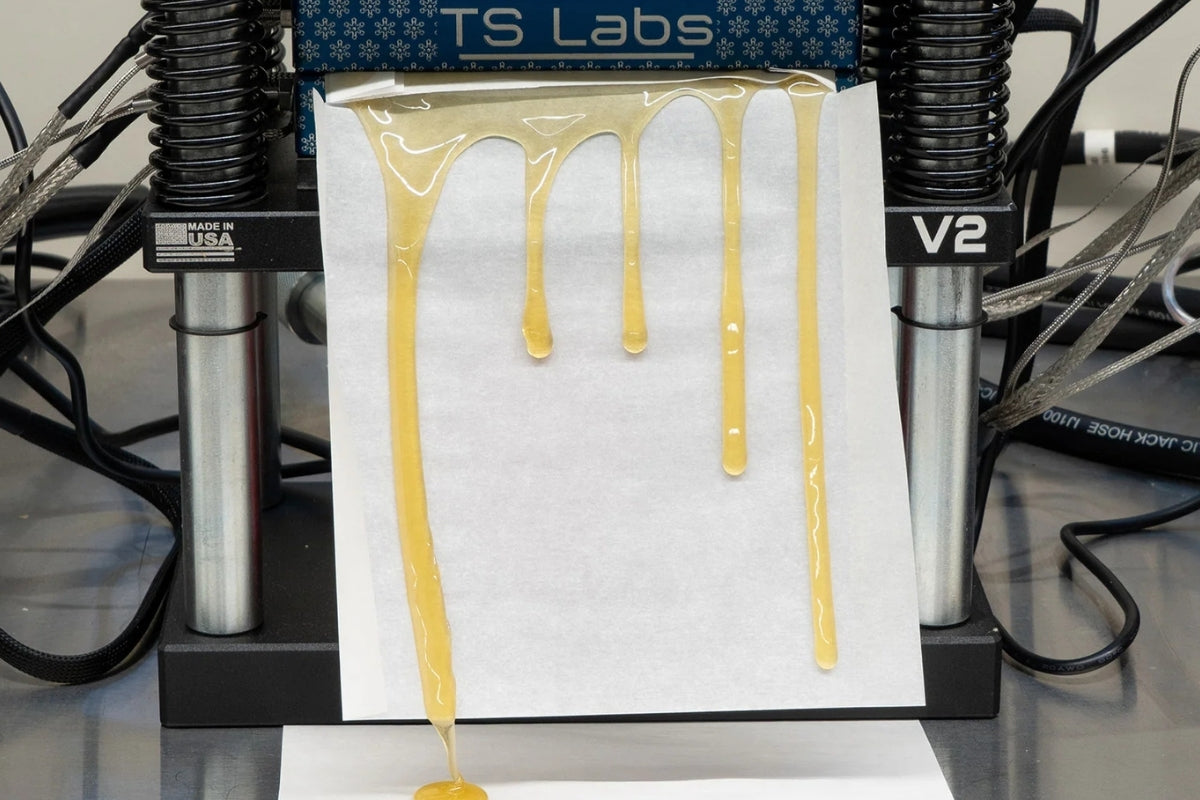 non clear tech rosin on a rosin press