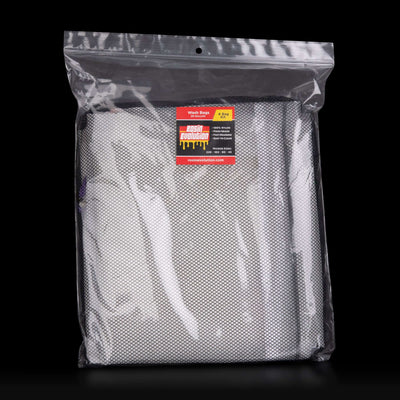 Clear plastic bag with a product inside and a visible brand label on a black background
