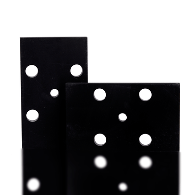 Two black sandpaper sheets with white holes on a white background