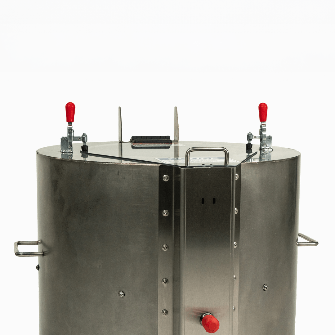 Stainless steel tank with red valves on a white background