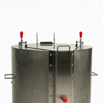 Stainless steel tank with red valves on a white background