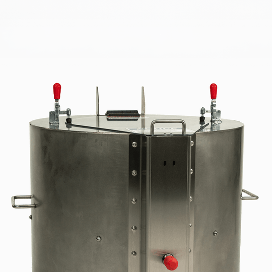 Stainless steel tank with red valves on a white background