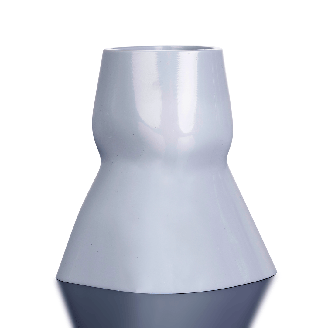 White ceramic vase on a white background