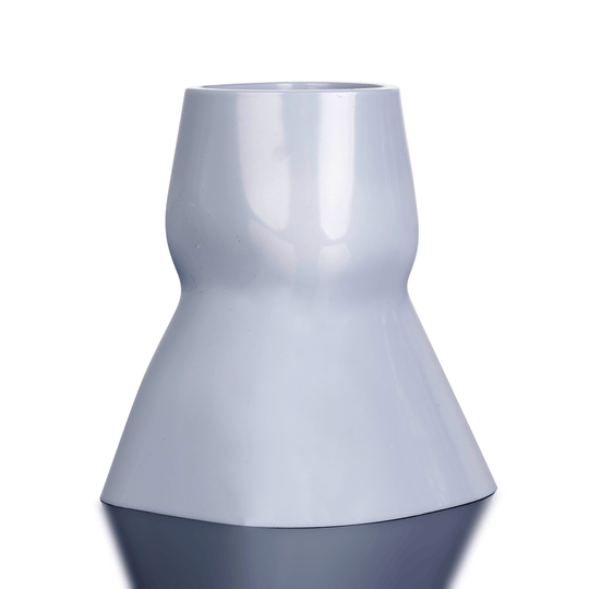 White ceramic vase on a white background