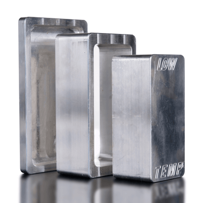Three metallic rectangular blocks with 'LOW' and 'TEMP' branding on a reflective surface.