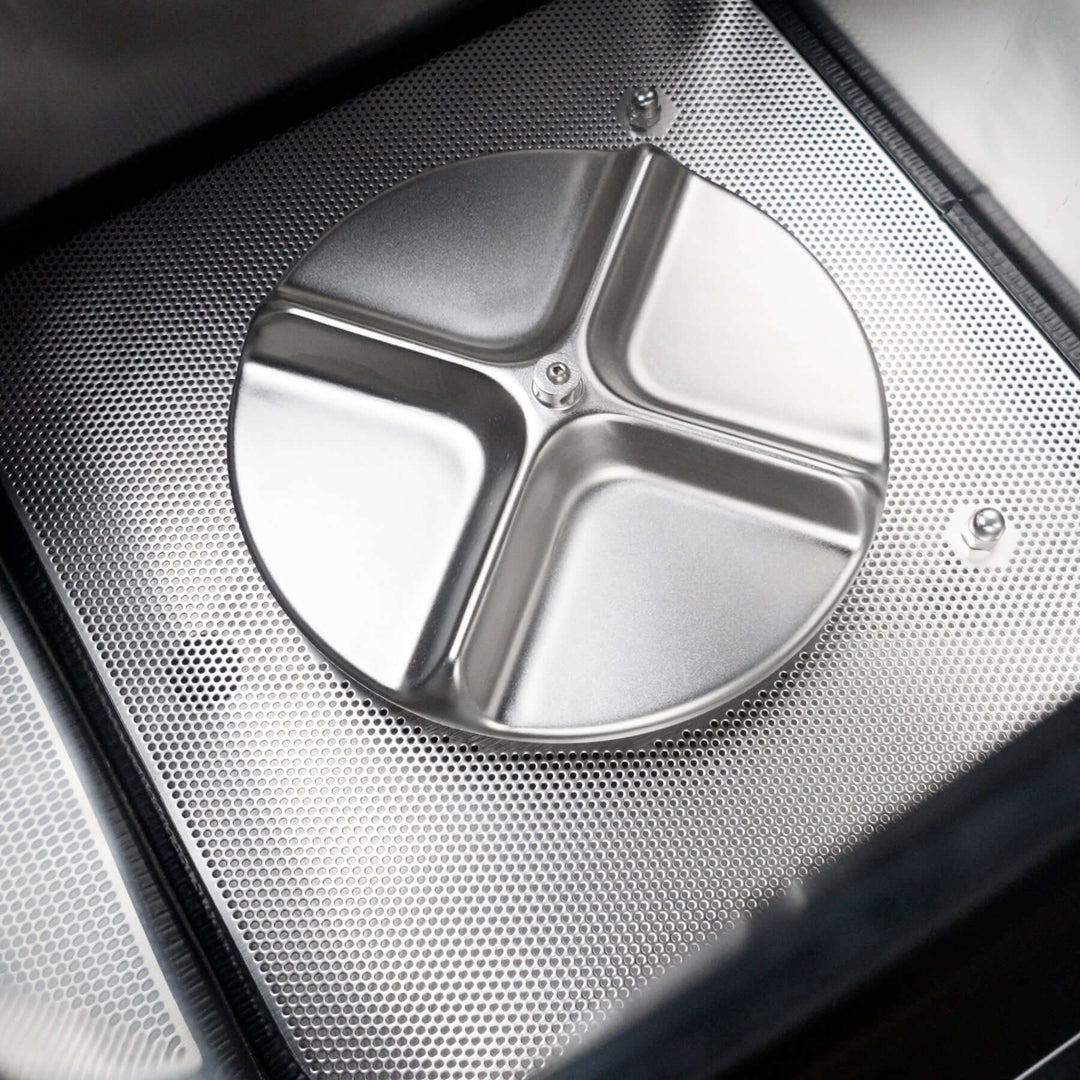 Metallic three-section cover on a textured surface