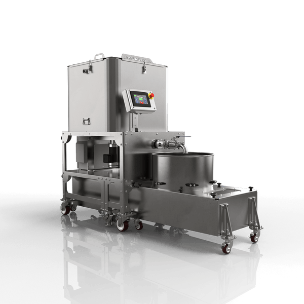 Stainless steel industrial machine on a reflective surface with a black background