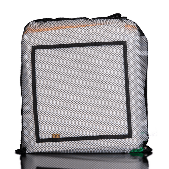 Mesh packing cube with black border on a white background