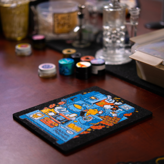 Colorful coaster with cartoon design on a wooden surface