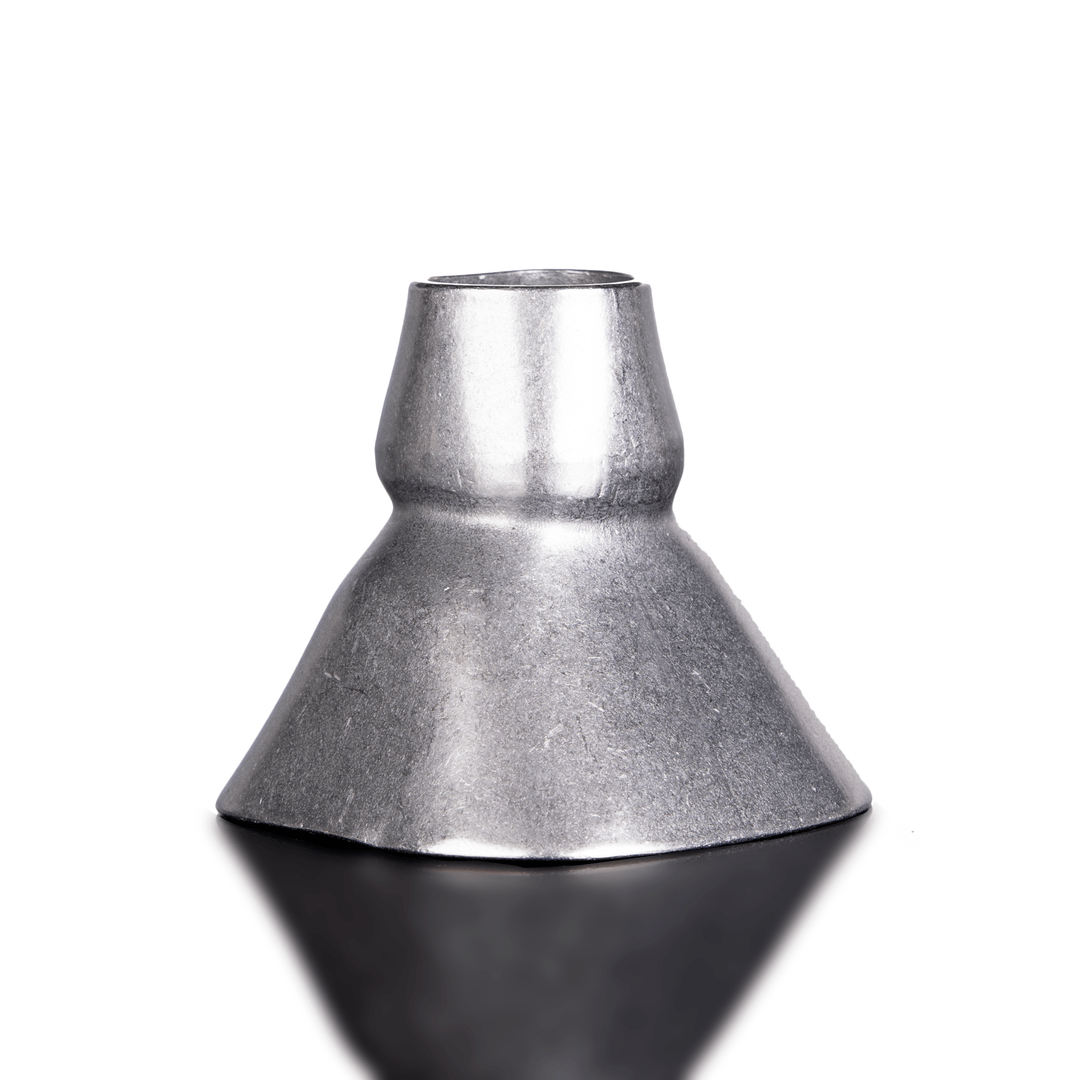 Metallic cone-shaped object on a white background