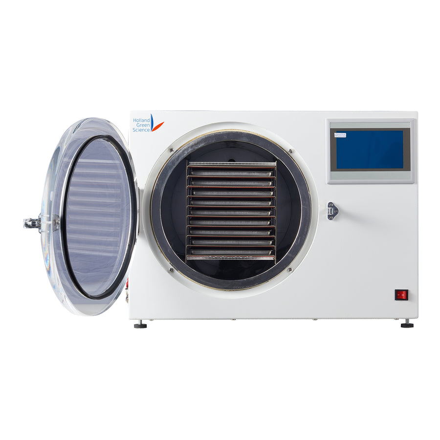 Xiros Mikro freeze dryer with open door showing shelf system for solventless extraction